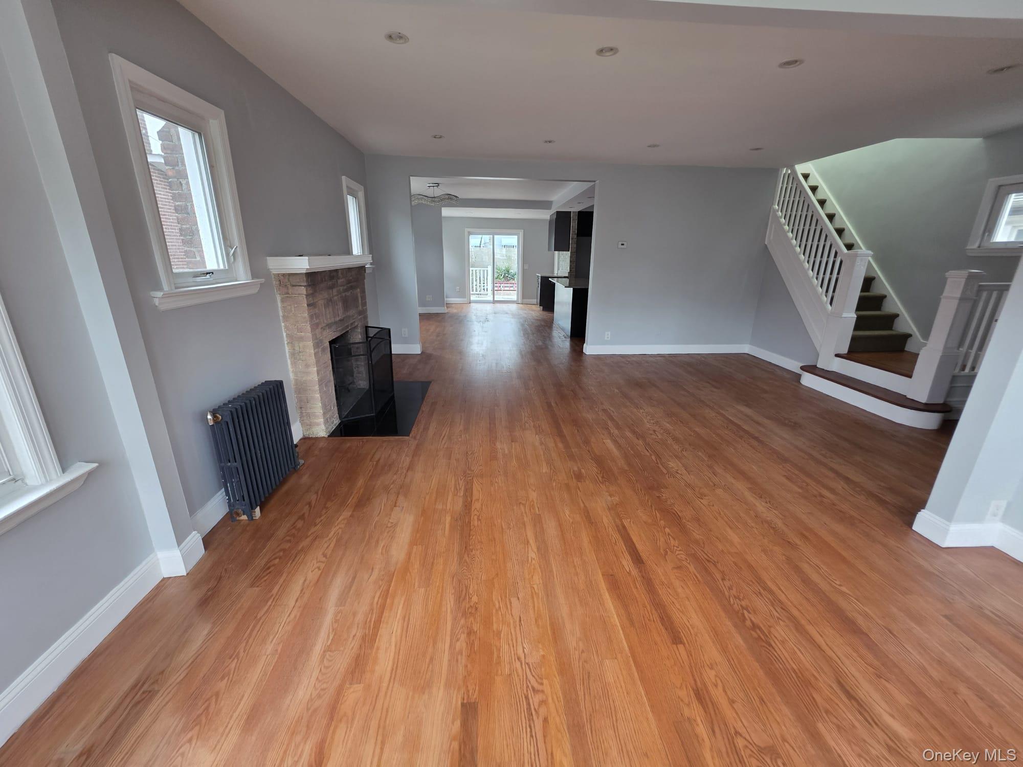 109-73 200th Street Queens, NY 11412 - Photo 10 of 12 a view of livingroom with furniture and wooden floor