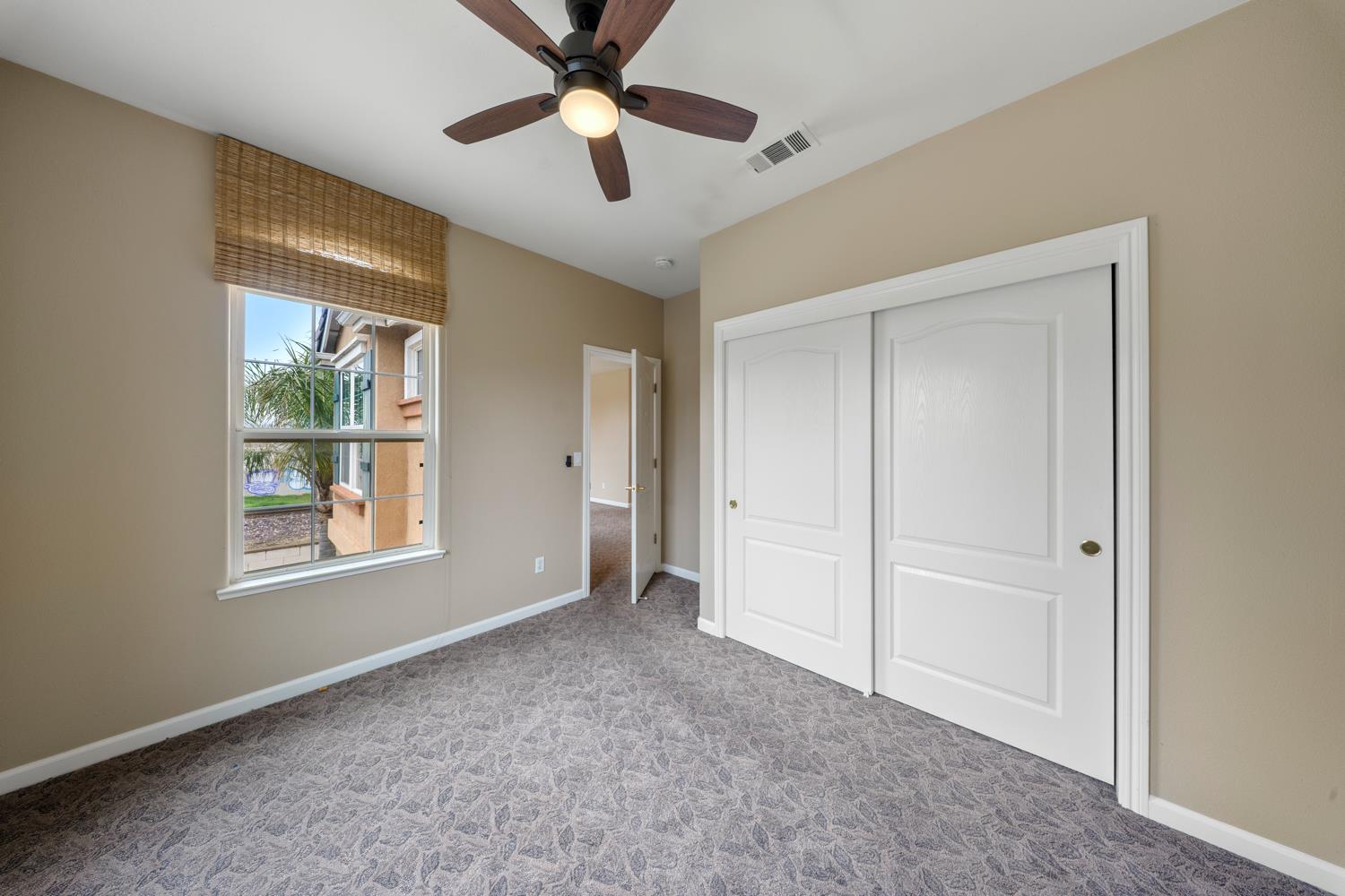 4601 Vía Altura Modesto, CA 95357 - Photo 26 of 30 a view of an empty room with a window