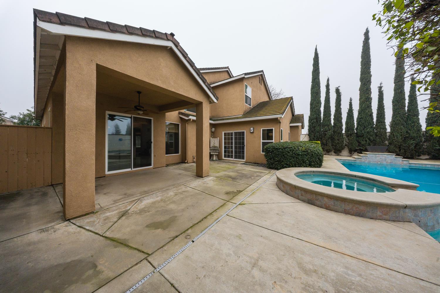 4601 Vía Altura Modesto, CA 95357 - Photo 27 of 30 a front view of a house with garden