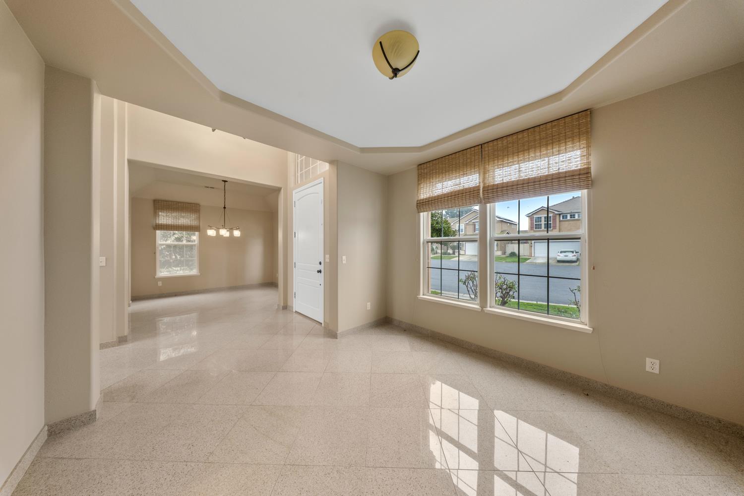 4601 Vía Altura Modesto, CA 95357 - Photo 5 of 30 a view of an empty room with a window