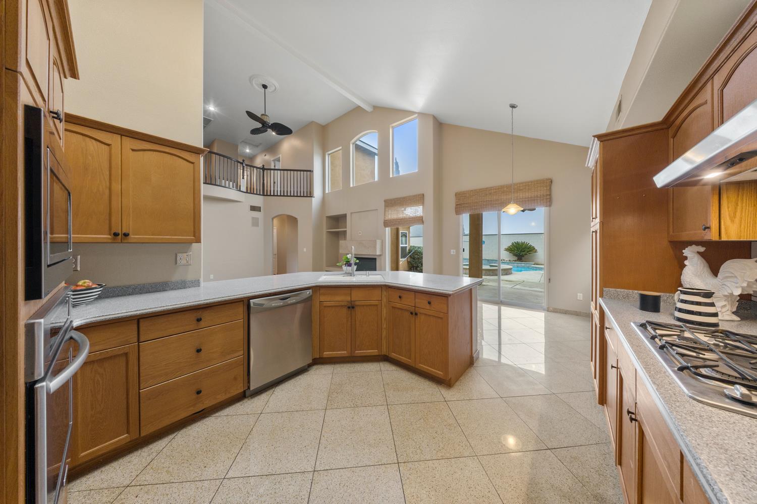 4601 Vía Altura Modesto, CA 95357 - Photo 7 of 30 a large kitchen with a large window