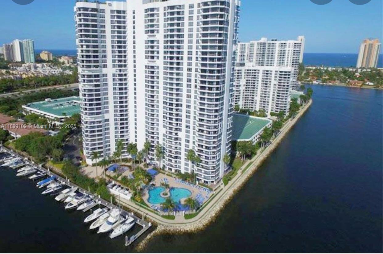 3530 Mystic Pointe Drive, Unit 2503 Aventura, FL 33180 - Photo 18 of 24 a city view from balcony