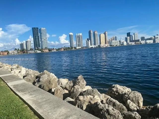 a view of roof deck with furniture