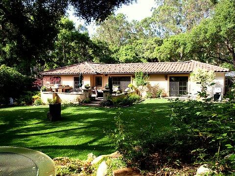 908 El Rancho Road Santa Barbara, CA 93108 - Photo 1 of 9 a front view of a house with a garden