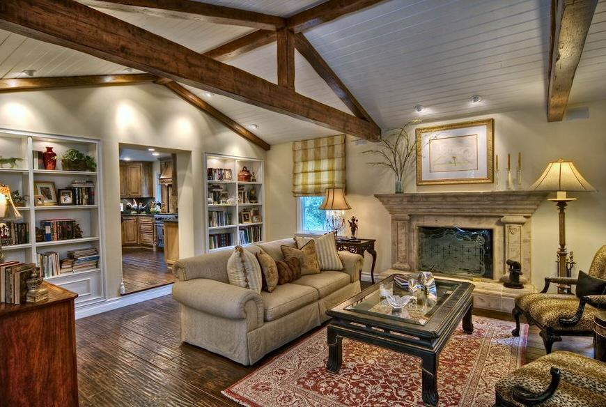 908 El Rancho Road Santa Barbara, CA 93108 - Photo 2 of 9 a living room with furniture a fireplace and a flat screen tv