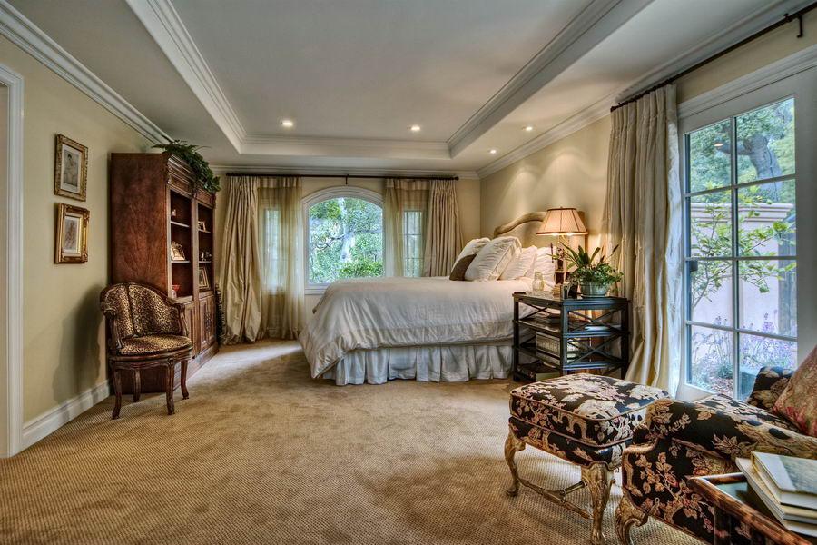 908 El Rancho Road Santa Barbara, CA 93108 - Photo 6 of 9 a bedroom with furniture and a large window