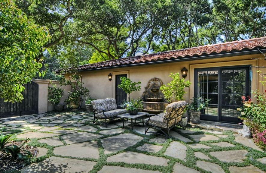 908 El Rancho Road Santa Barbara, CA 93108 - Photo 8 of 9 a view of a house with backyard outdoor seating and green space