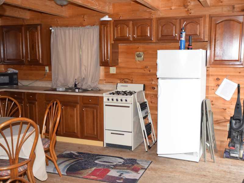 750 Dwinal Pond Road Winn, ME 04495 - Photo 6 of 18 Kitchen. Propane stove for cooking...