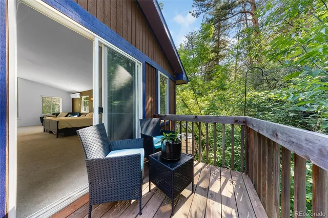 a bedroom with bed and window