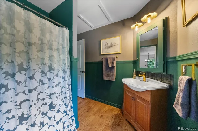 a view of a wooden house with a yard