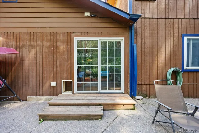 a view of roof deck with patio