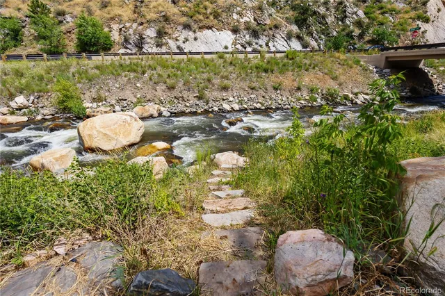 a view of swimming pool from a yard