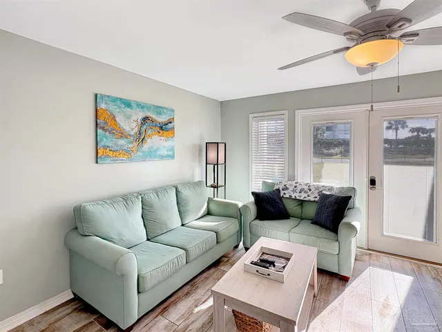 a living room with furniture and a couch