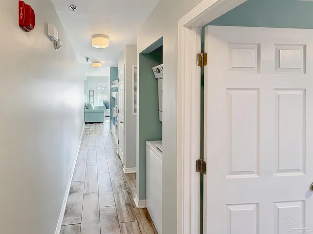 a view of a bathroom from the hallway