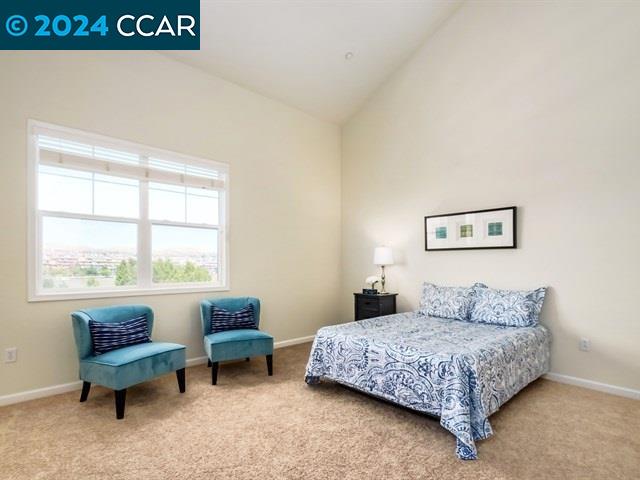 3666 Finnian Way Dublin, CA 94568 - Photo 11 of 17 a bedroom with a bed a couch and a window