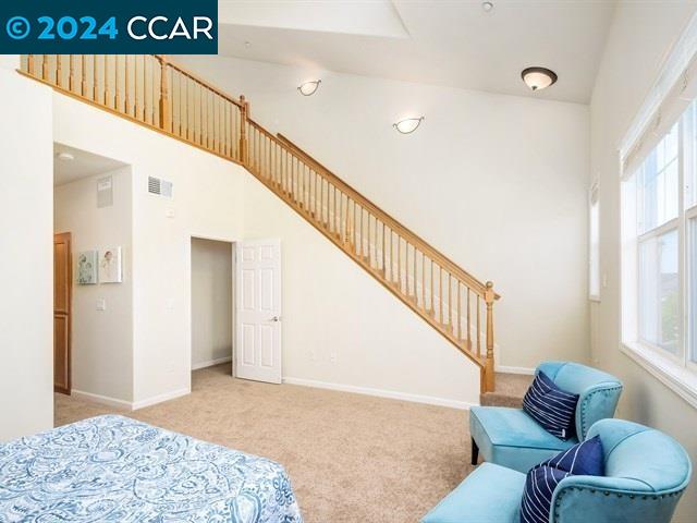 3666 Finnian Way Dublin, CA 94568 - Photo 12 of 17 a bedroom with furniture and stairs