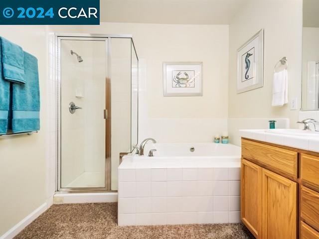3666 Finnian Way Dublin, CA 94568 - Photo 15 of 17 a bathroom with a sink a mirror and a shower