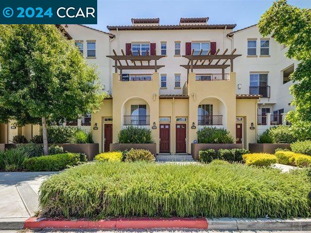 3666 Finnian Way Dublin, CA 94568 - Photo 2 of 17 a view of multiple house with a yard
