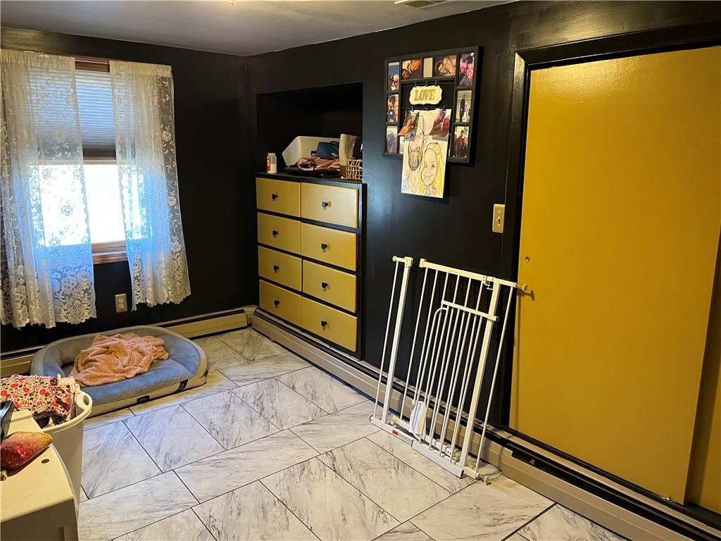 726 Lawsonham Road Rimersburg, PA 16248 - Photo 11 of 17 a bedroom with a bed and wooden floor