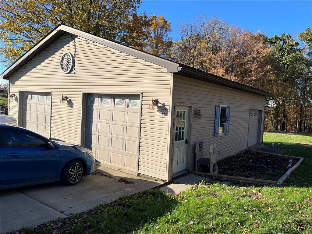 726 Lawsonham Road Rimersburg, PA 16248 - Photo 4 of 17 a view of a car in front of a house