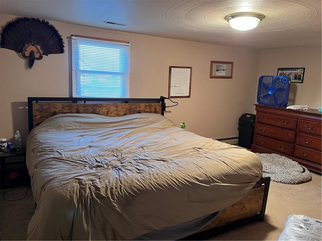 726 Lawsonham Road Rimersburg, PA 16248 - Photo 9 of 17 a bedroom with a bed and window