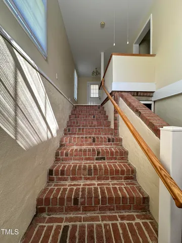 a view of entryway with a front door