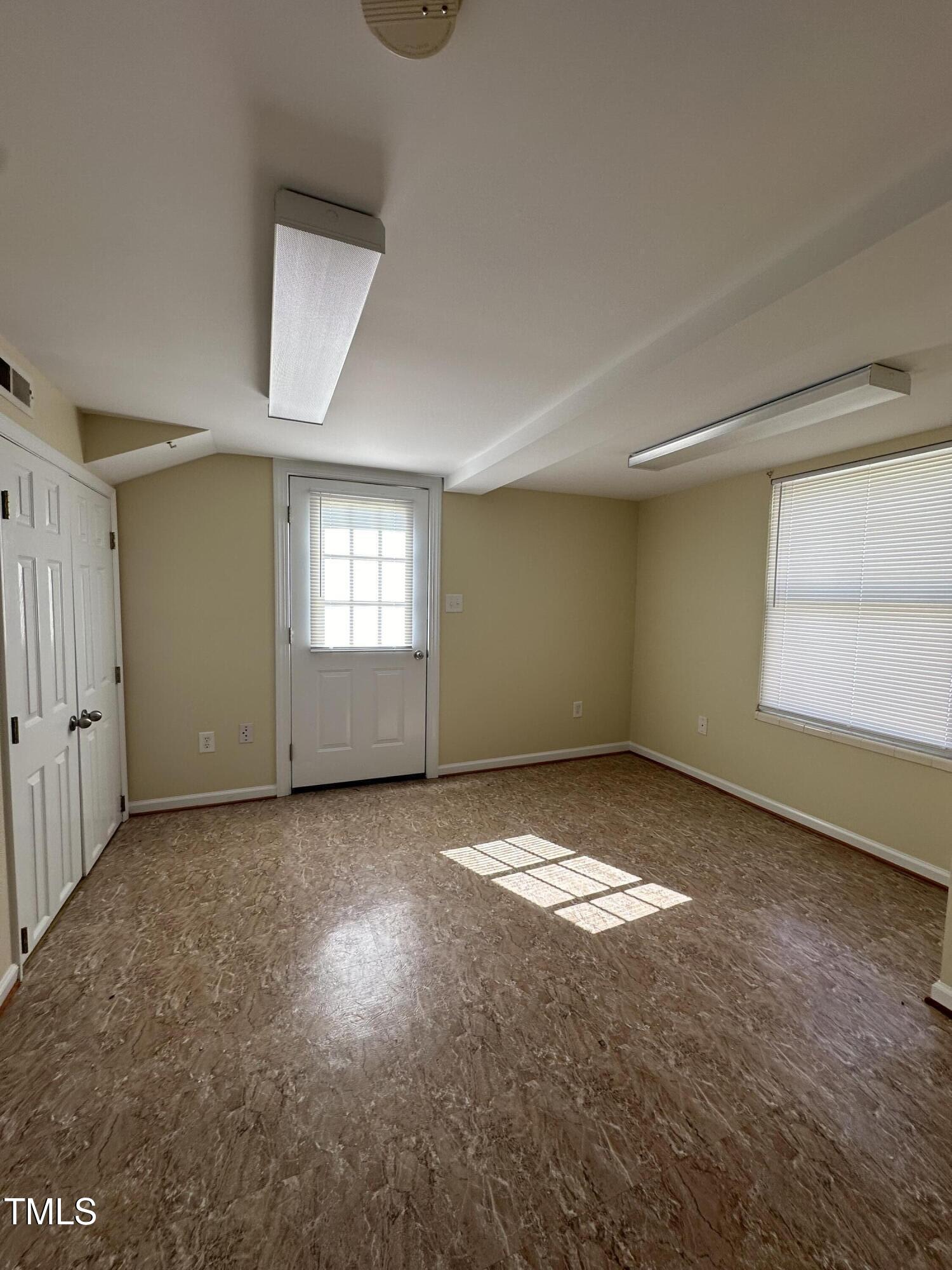 203 North 9th Street Mebane, NC 27302 - Photo 10 of 10 a view of an empty room with a window