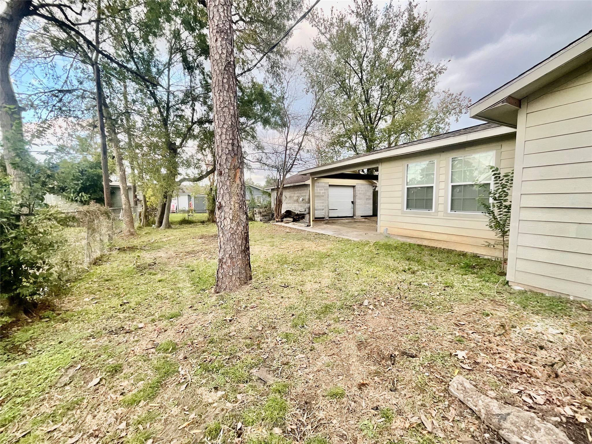 9213 Madera Road Houston, TX 77078 - Photo 2 of 15 a view of a house with a yard