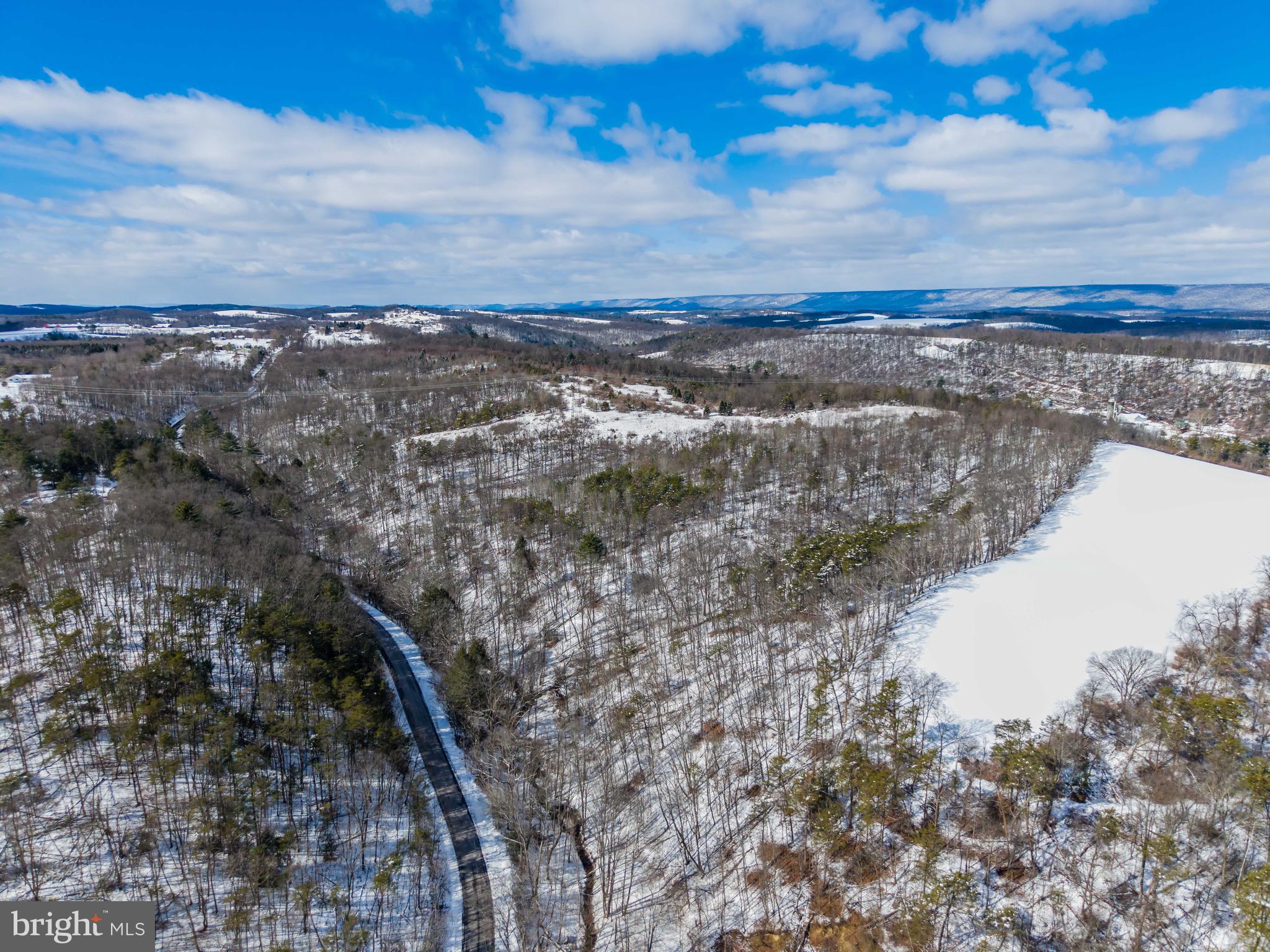 0 Spiggs Hill Road Mount Pleasant Mills, PA 17853 - Photo 5 of 11 a view of lake and mountain