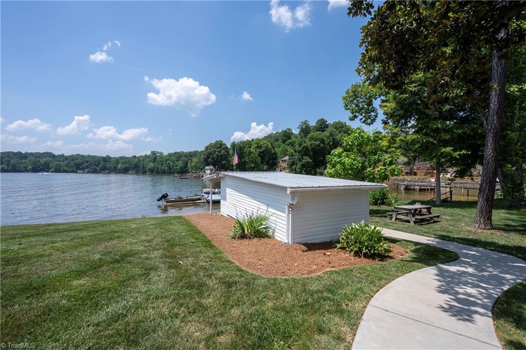 2113 Warf Road Lexington, NC 27292 - Photo 12 of 50 New dock and floater in 2020 and recently stained in 2026