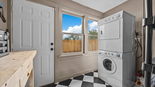 a view of a kitchen with washer and dryer