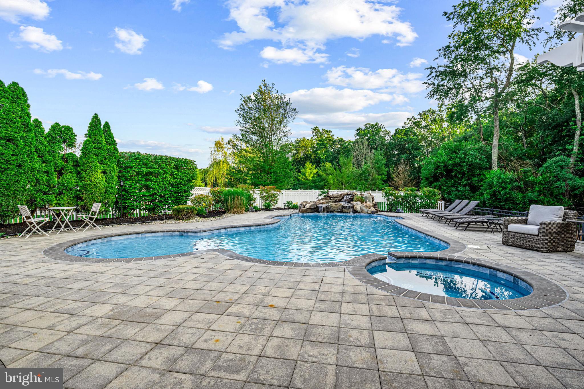22 Tara Drive Sewell, NJ 08080 - Photo 16 of 70 a view of a swimming pool with seating space