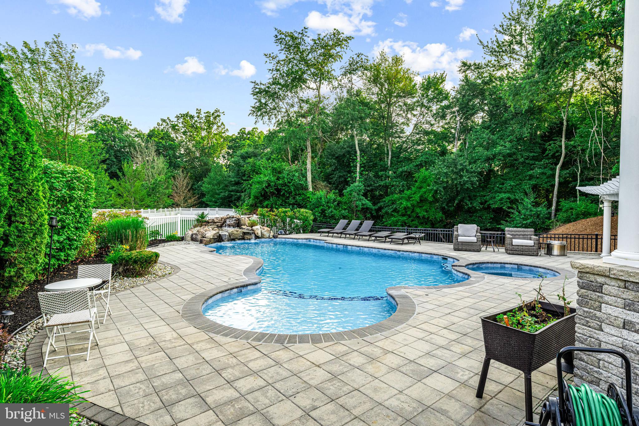 22 Tara Drive Sewell, NJ 08080 - Photo 20 of 70 a view of a swimming pool with outdoor seating