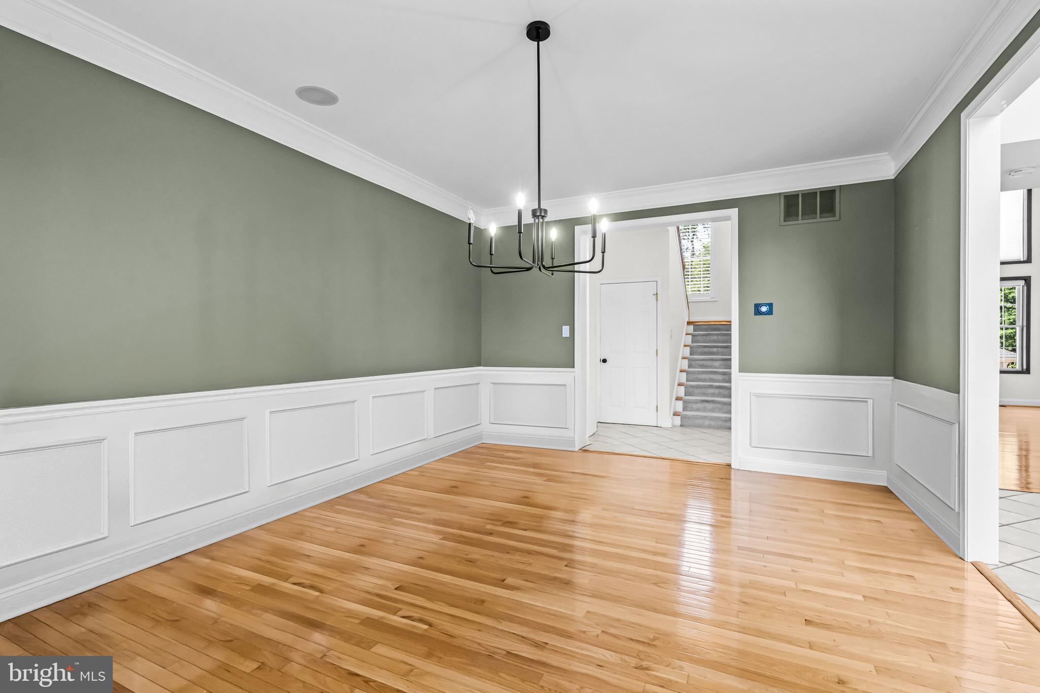 22 Tara Drive Sewell, NJ 08080 - Photo 27 of 70 a view of a room with wooden floor and chandelier