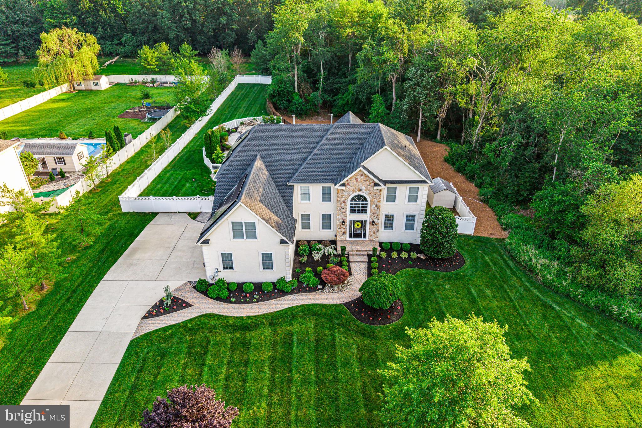 22 Tara Drive Sewell, NJ 08080 - Photo 3 of 70 a front view of a house with garden