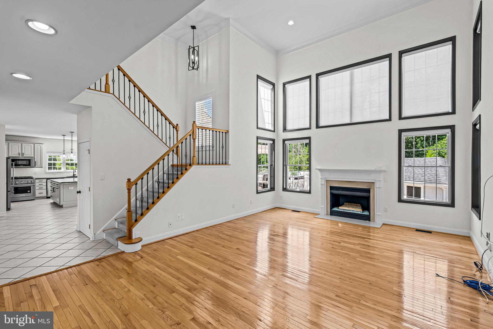 22 Tara Drive Sewell, NJ 08080 - Photo 31 of 70 a view of an empty room with wooden floor and a fireplace