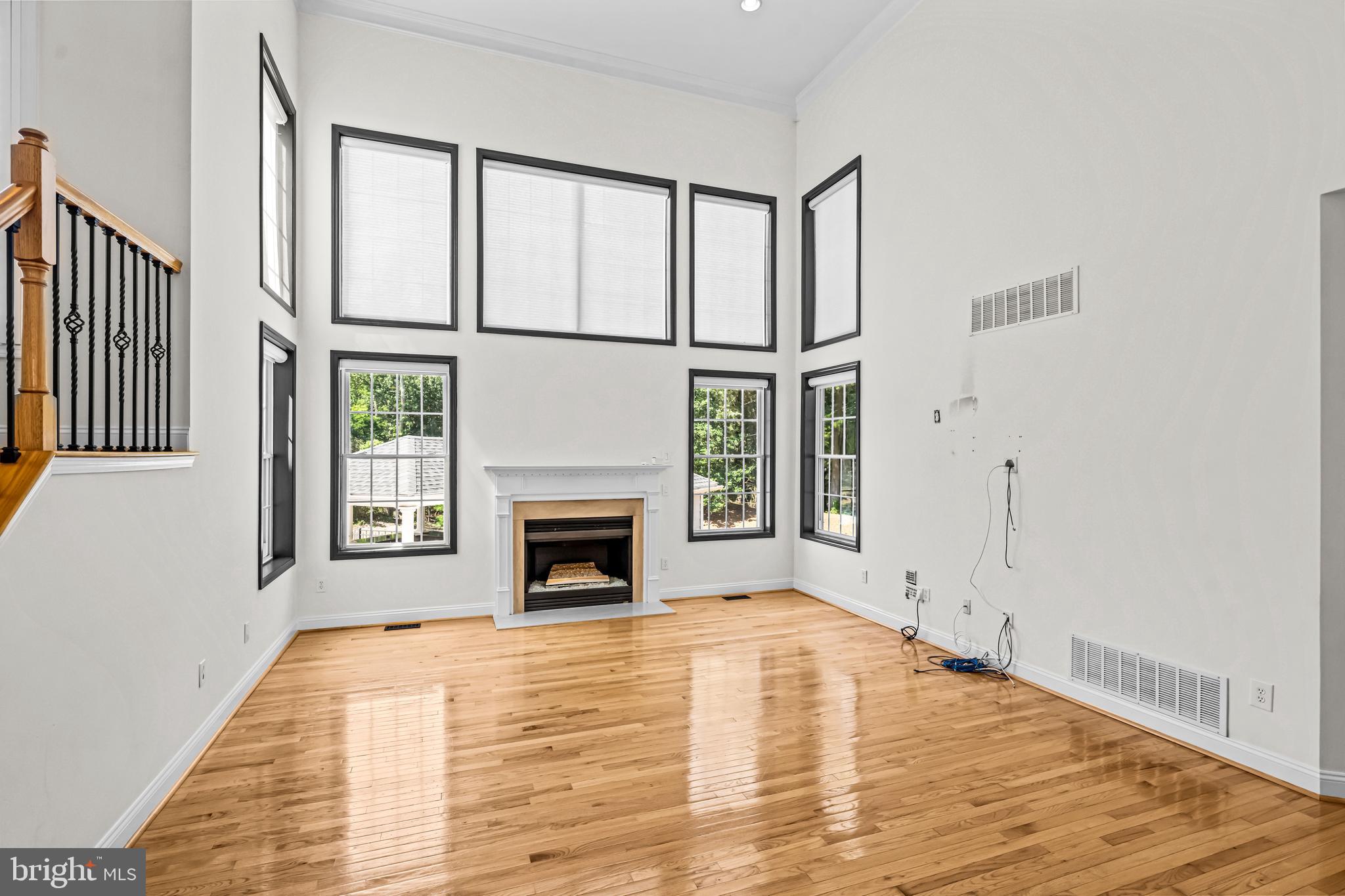 22 Tara Drive Sewell, NJ 08080 - Photo 33 of 70 a view of empty room with wooden floor and fan