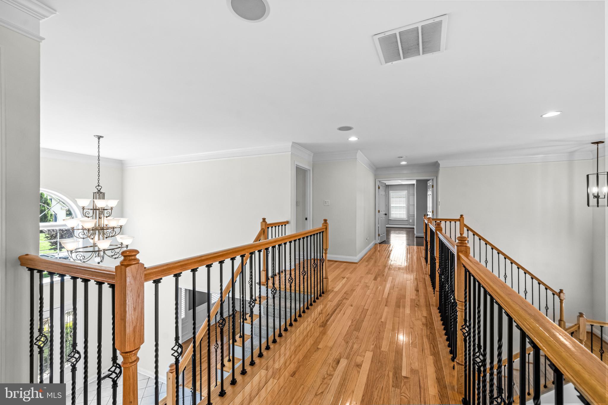 22 Tara Drive Sewell, NJ 08080 - Photo 48 of 70 a view of a hallway with wooden floor and stairs