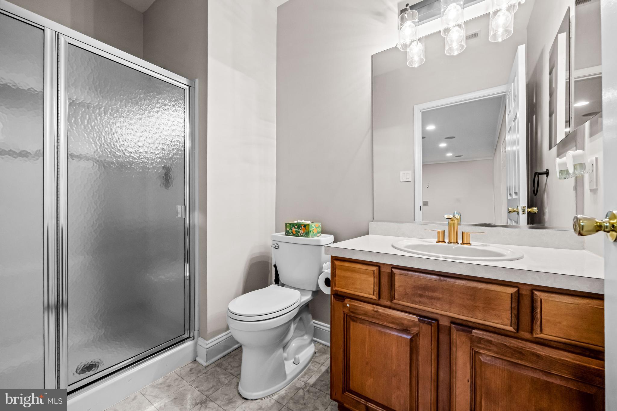 22 Tara Drive Sewell, NJ 08080 - Photo 64 of 70 a bathroom with a sink a toilet and shower