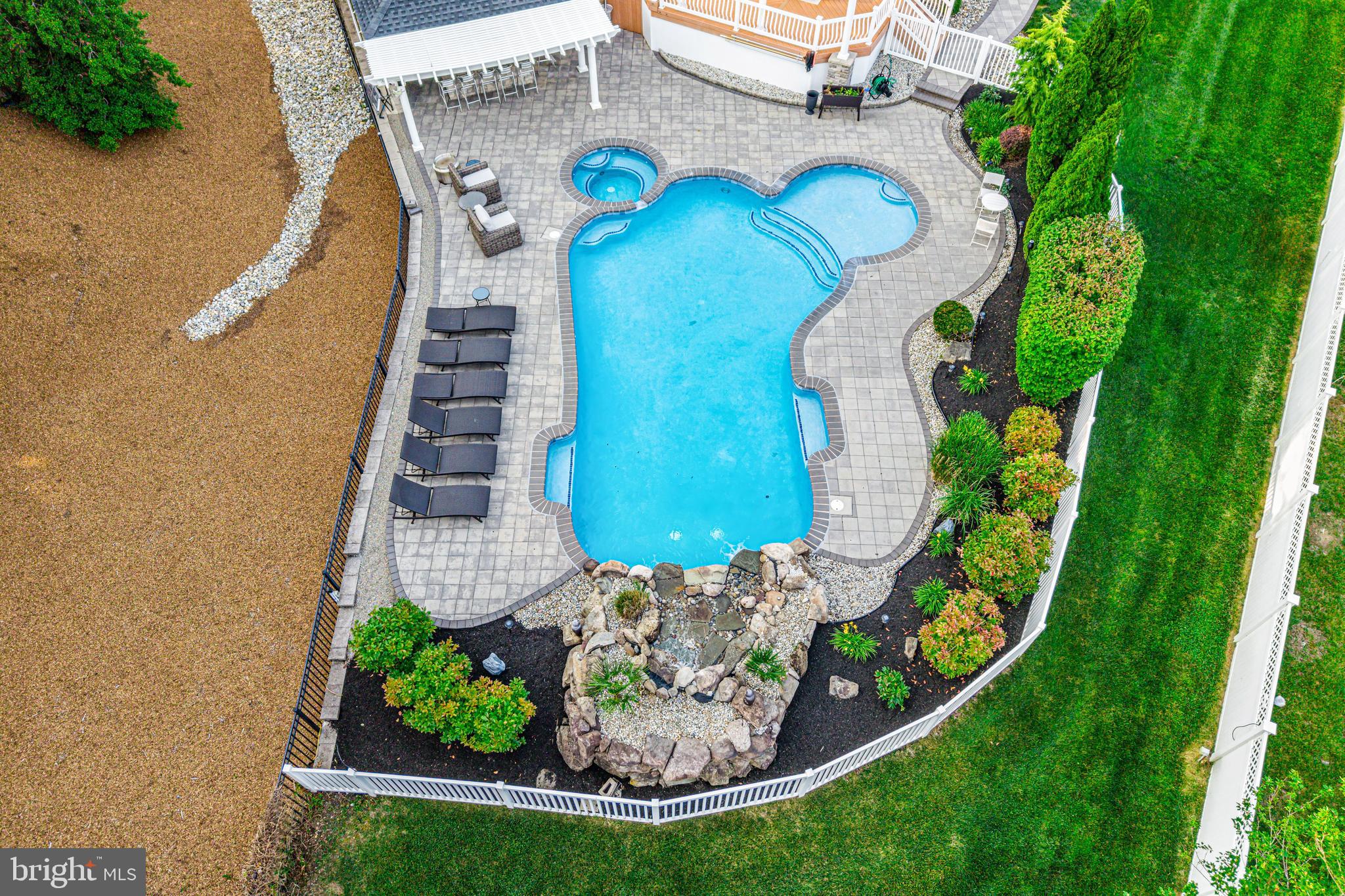 22 Tara Drive Sewell, NJ 08080 - Photo 8 of 70 a view of a swimming pool with sitting area