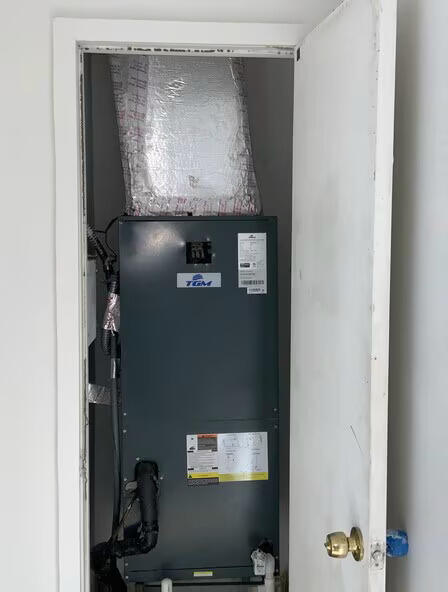 611 South Pine Street, Unit B Lake Worth Beach, FL 33460 - Photo 1 of 1 a room with water heater and stainless steel appliances
