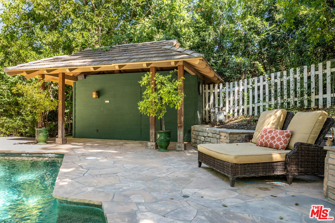 24878 Long Valley Road Hidden Hills, CA 91302 - Photo 15 of 54 a view of a couches in the patio