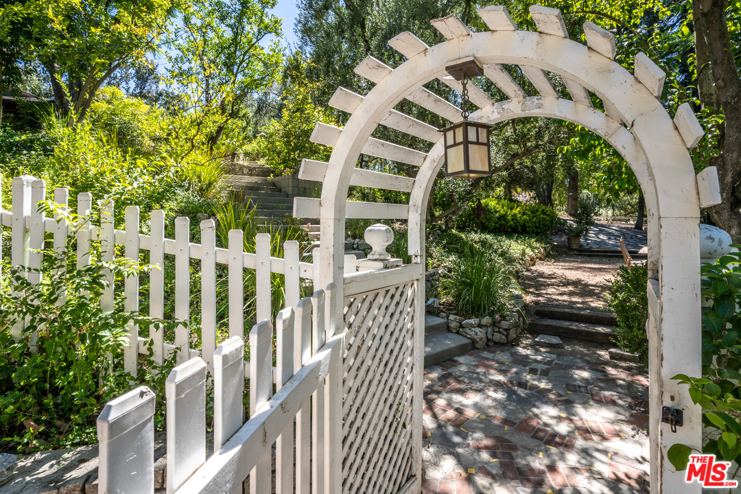 24878 Long Valley Road Hidden Hills, CA 91302 - Photo 17 of 54 a view of an entrance door of the house