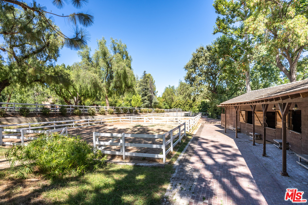 24878 Long Valley Road Hidden Hills, CA 91302 - Photo 4 of 54 a view of a backyard with sitting area