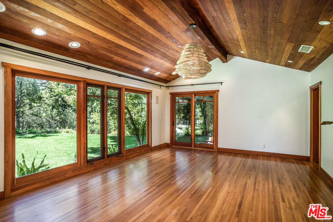24878 Long Valley Road Hidden Hills, CA 91302 - Photo 43 of 54 a view of room with window and wooden floor