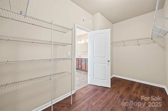 a view of an empty walk in closet