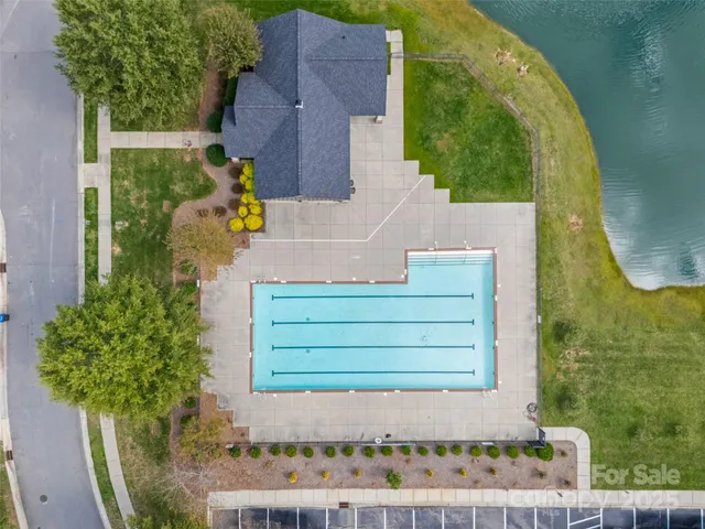 an aerial view of a house with a garden