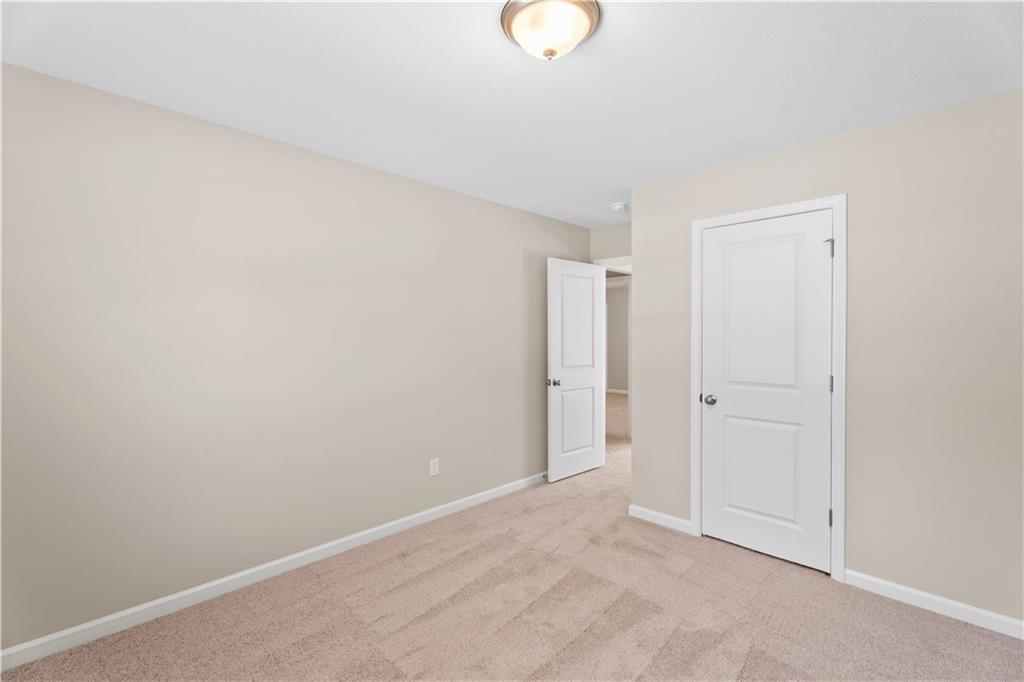 31 Whiterock Road Phenix City, AL 36869 - Photo 24 of 36 Unfurnished bedroom with carpet floors and baseboards