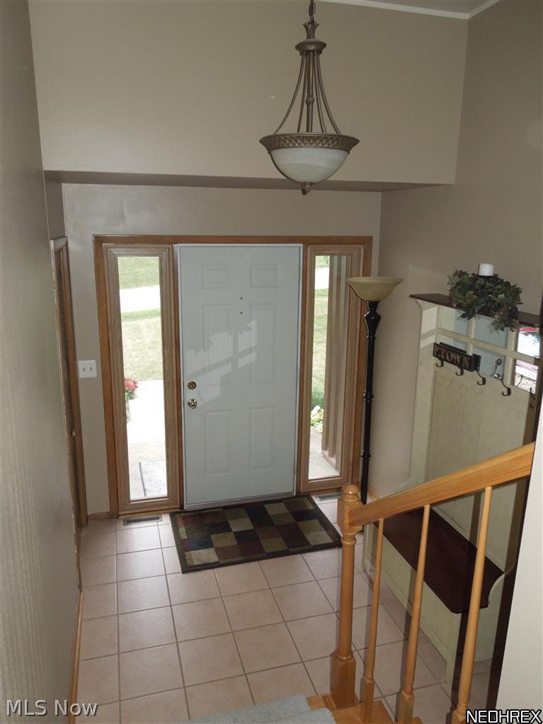 4604 5th Street Northwest Canton, OH 44708 - Photo 2 of 25 This beautiful tiled foyer is a great place to greet your family and guest with warmth!