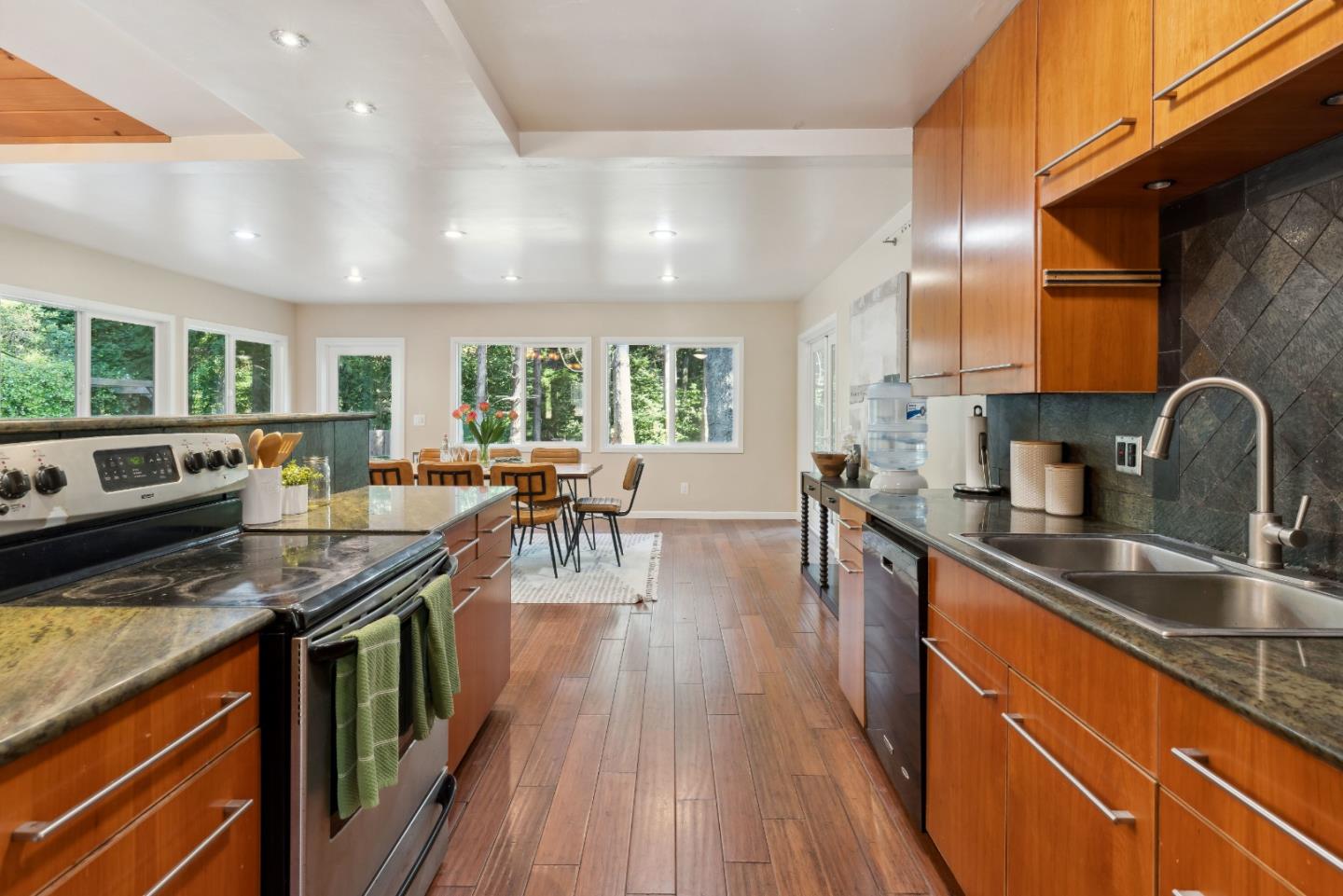 1850 Pine Flat Road Santa Cruz, CA 95060 - Photo 15 of 62 a kitchen with lots of counter top space a sink appliances and cabinets